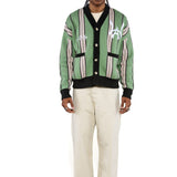 Male model wearing the WOA City cardigan mint on a white background