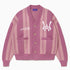 Pink striped cardigan with the WA logo on a white background