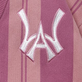 Close-up of the WA logo on the chest.