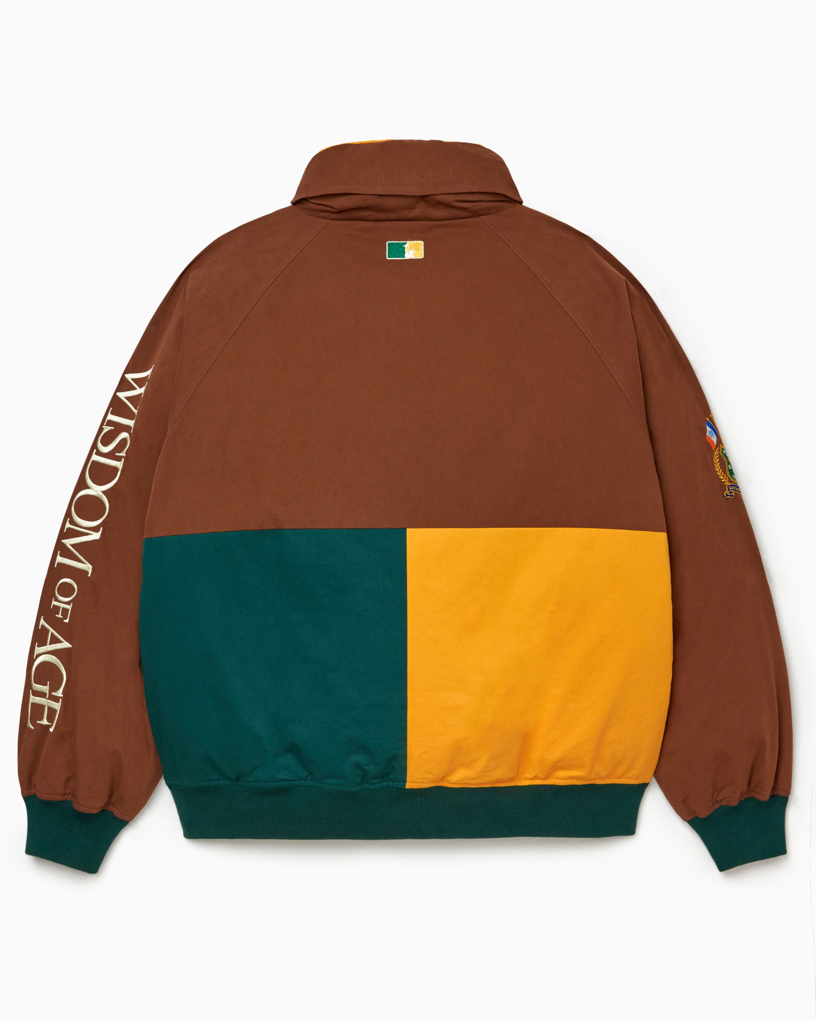 Mocha/ Marine Green/Yellow Color-blocked jacket with 'Wisdom of Age' branding on a white background