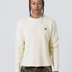 Front View of male Model Wearing Cream Wisdom Of Age knit thermal