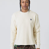 Front View of male Model Wearing Cream Wisdom Of Age knit thermal