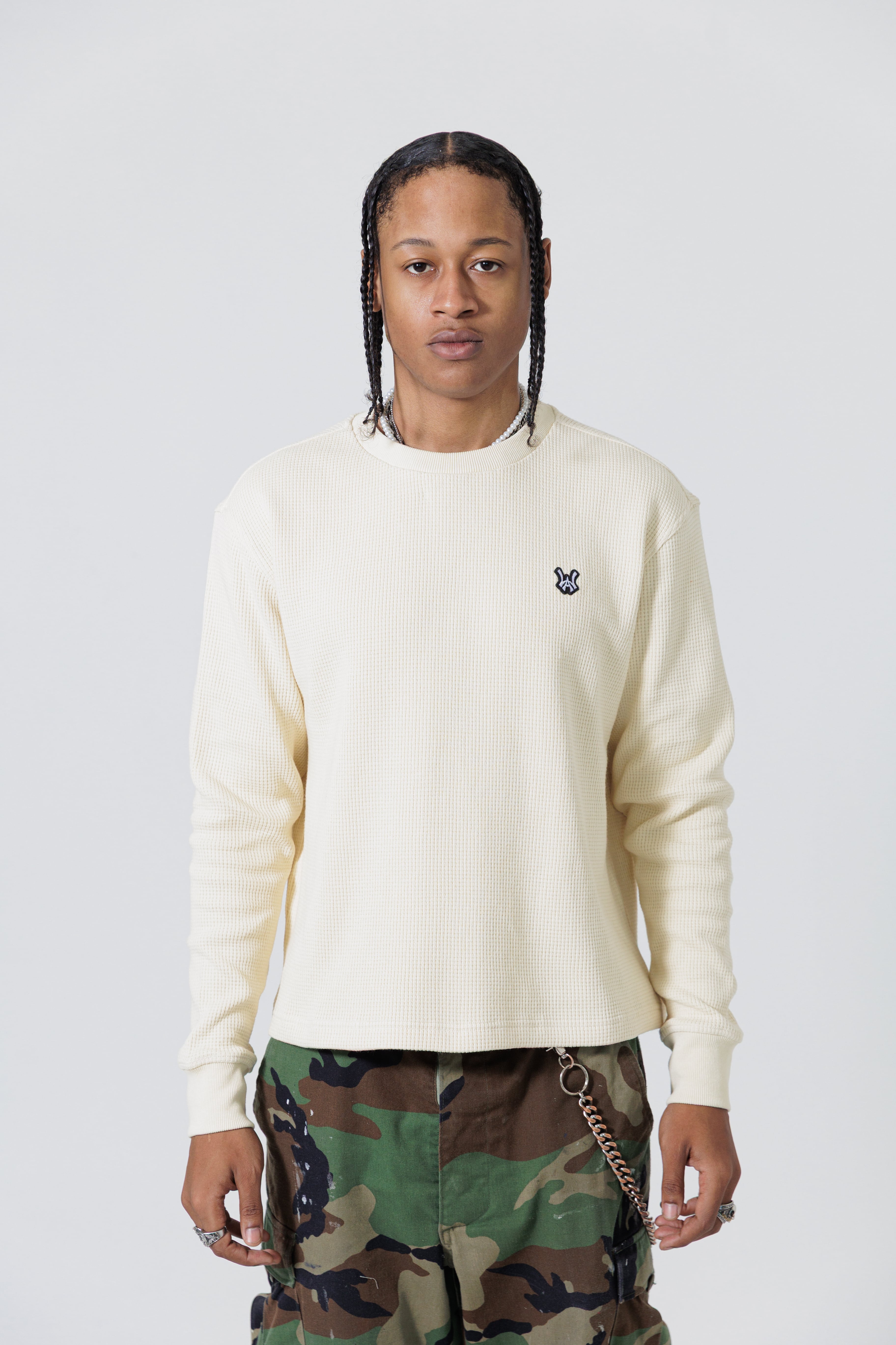 Front View of male Model Wearing Cream Wisdom Of Age knit thermal