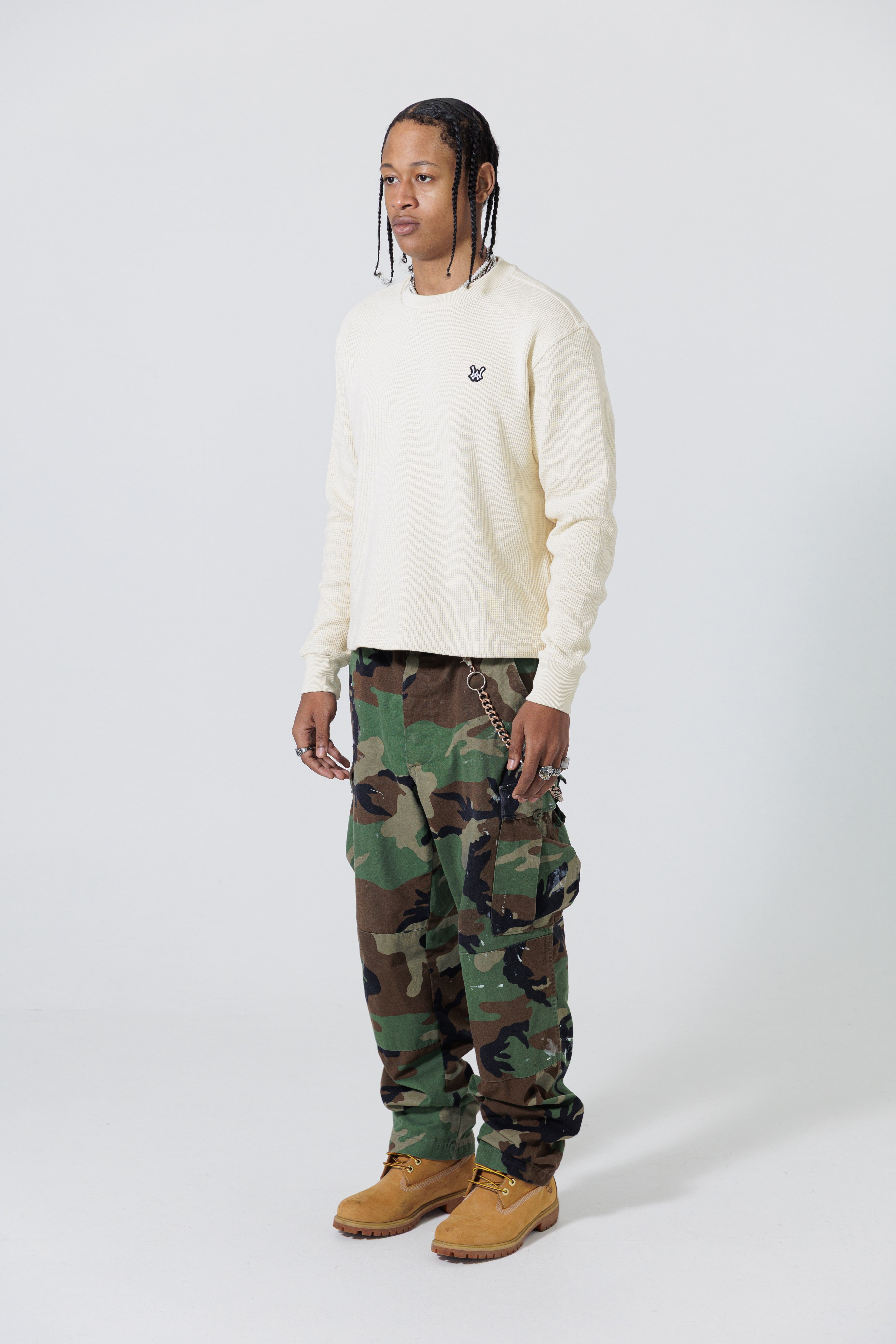 Male Model Wearing Cream Wisdom Of Age knit thermal
