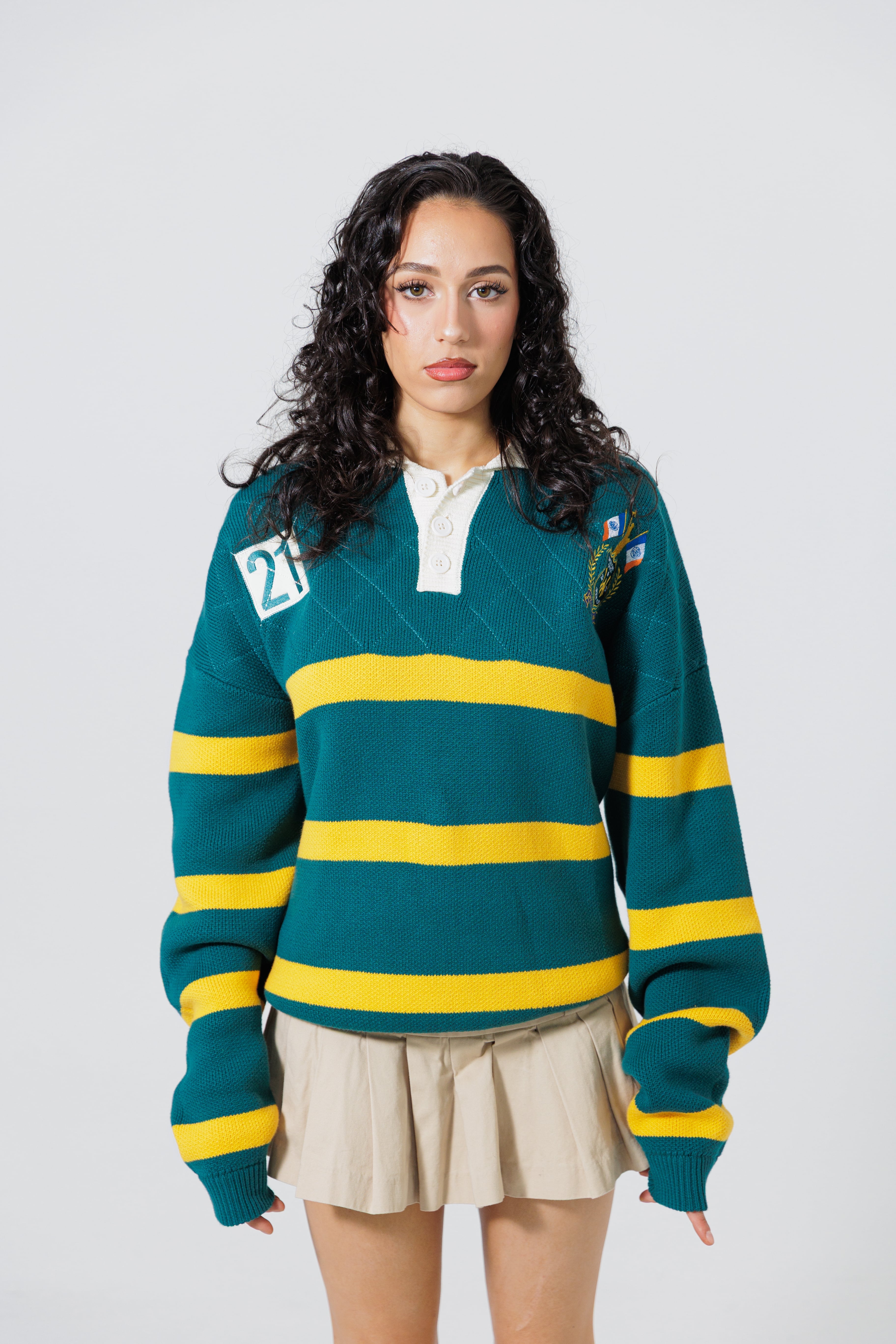 Front View Of A Female Model wearing The Wisdom Of Age Knit Rugby Sweater 
