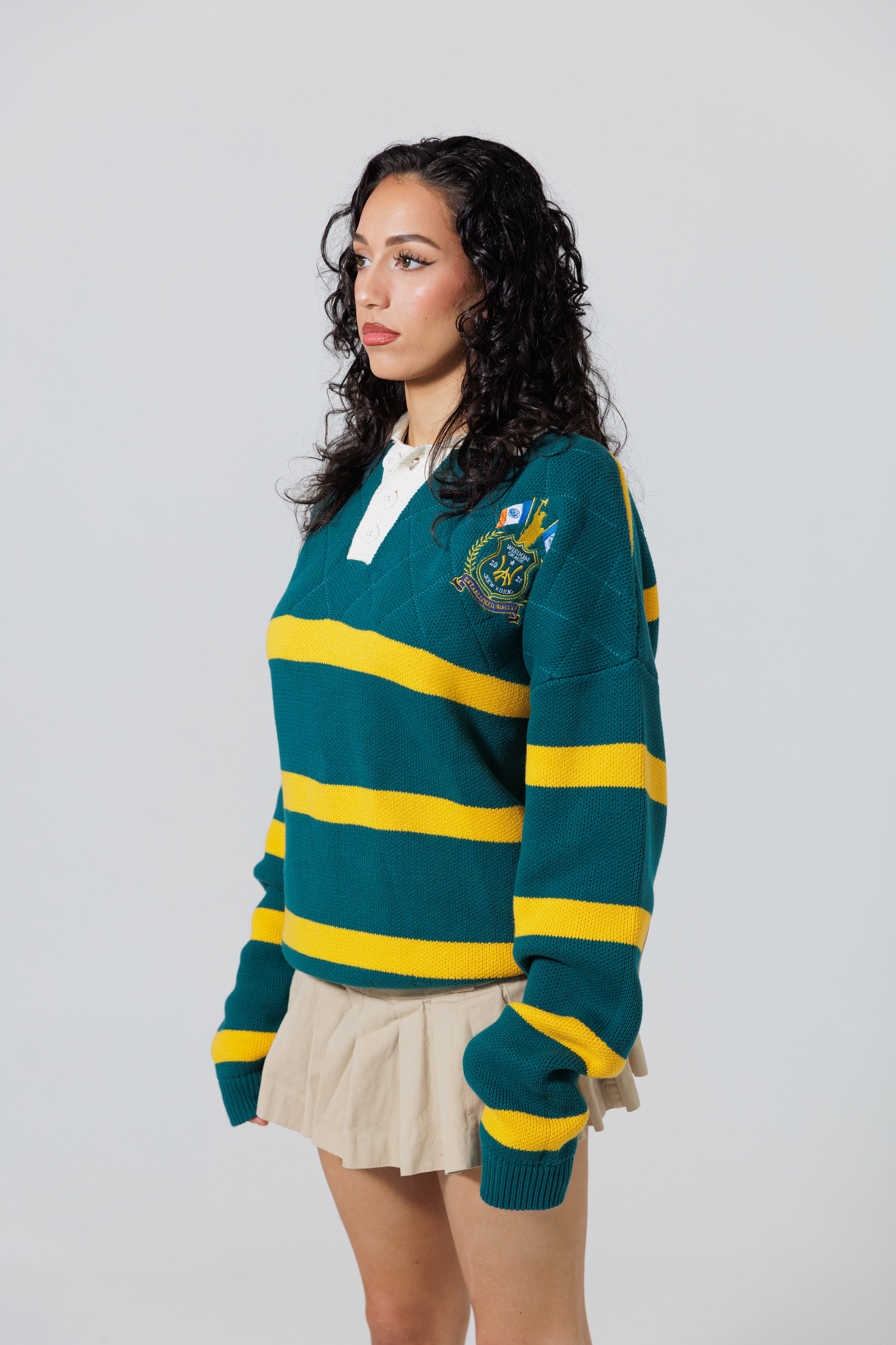 Front Side View Of A Female Model wearing The Wisdom Of Age Knit Rugby Sweater.