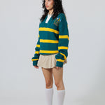 Full Body Front View Of A Female Model wearing The Wisdom Of Age Knit Rugby Sweater 