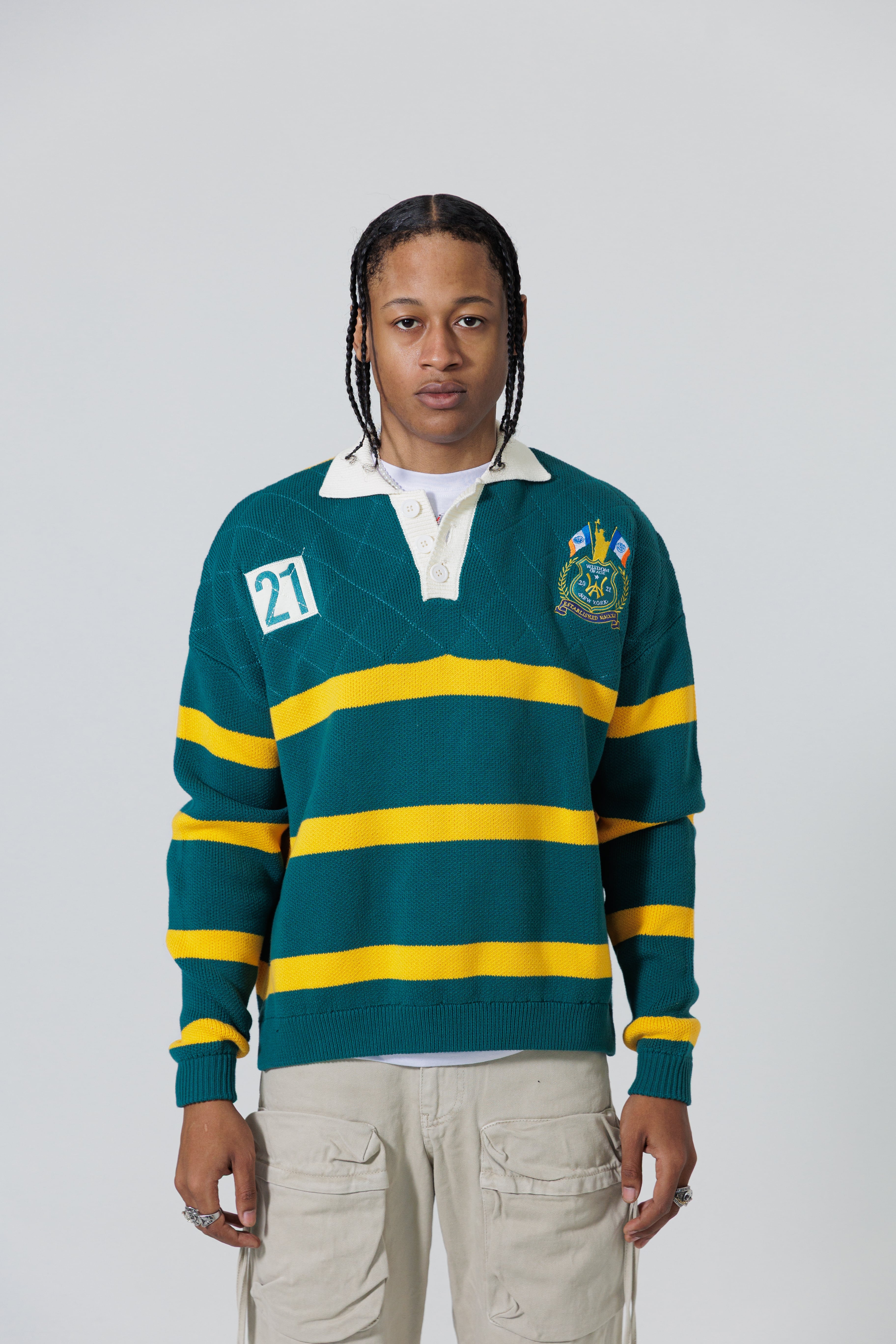 Front View Of A Male Model wearing The Wisdom Of Age Knit Rugby Sweater.
