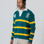Front Side View Of A Male Model wearing The Wisdom Of Age Knit Rugby Sweater.