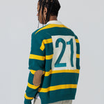 Rear View Of A Male Model wearing The Wisdom Of Age Knit Rugby Sweater.