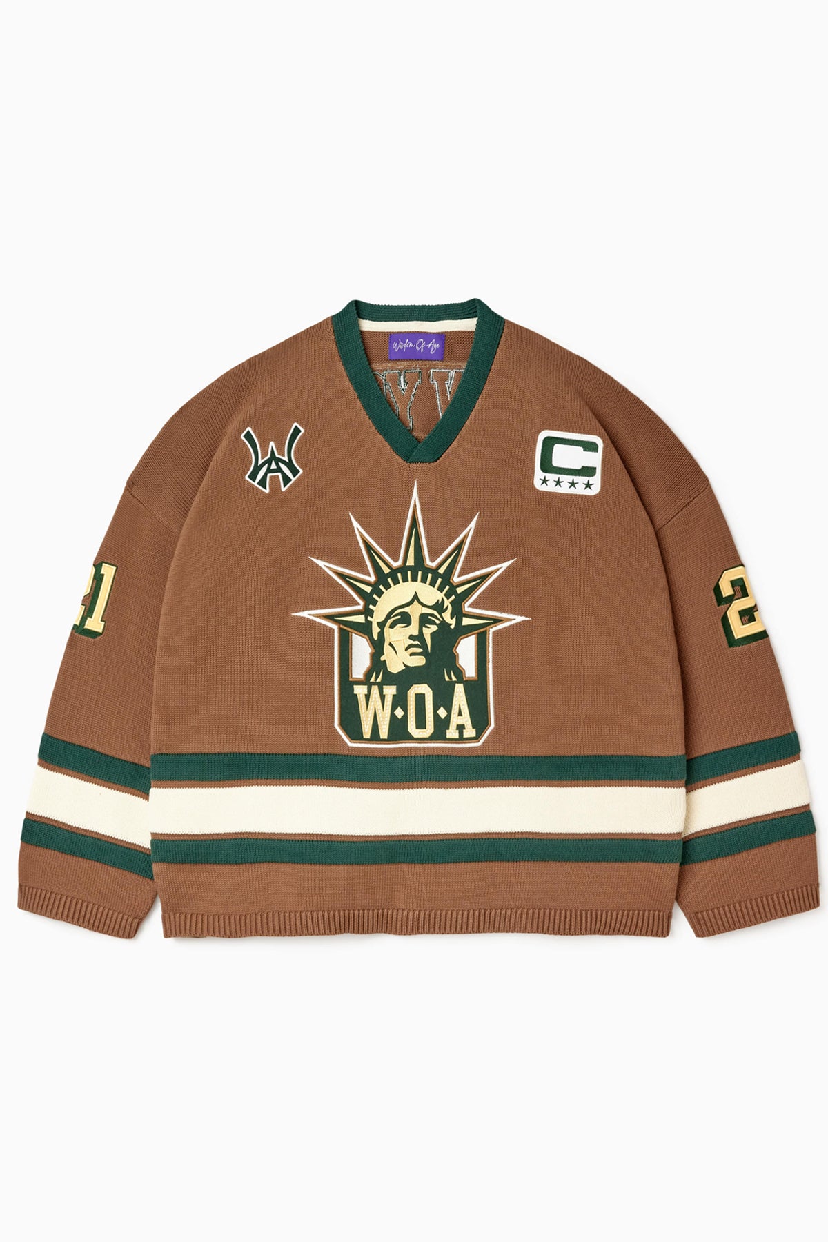 Front view of the Wisdom Of Age Knit Hockey jersey Autumn. WOA Liberty logo on the front with  and captains C on the left shoulder and a WA patch on the right shoulder. the number 21 on the sleeves