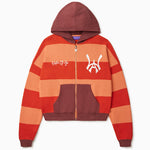 Front View Of the Wisdom Of Age Knit Zippered Hoodie. There are alternating horizontal orange stripes. One stripe is a darker shade of Orange. WA logo on left chest, Wisdom Of Age written in the signature font on the right chest. Kangaroo pockets separated by the zipper.
