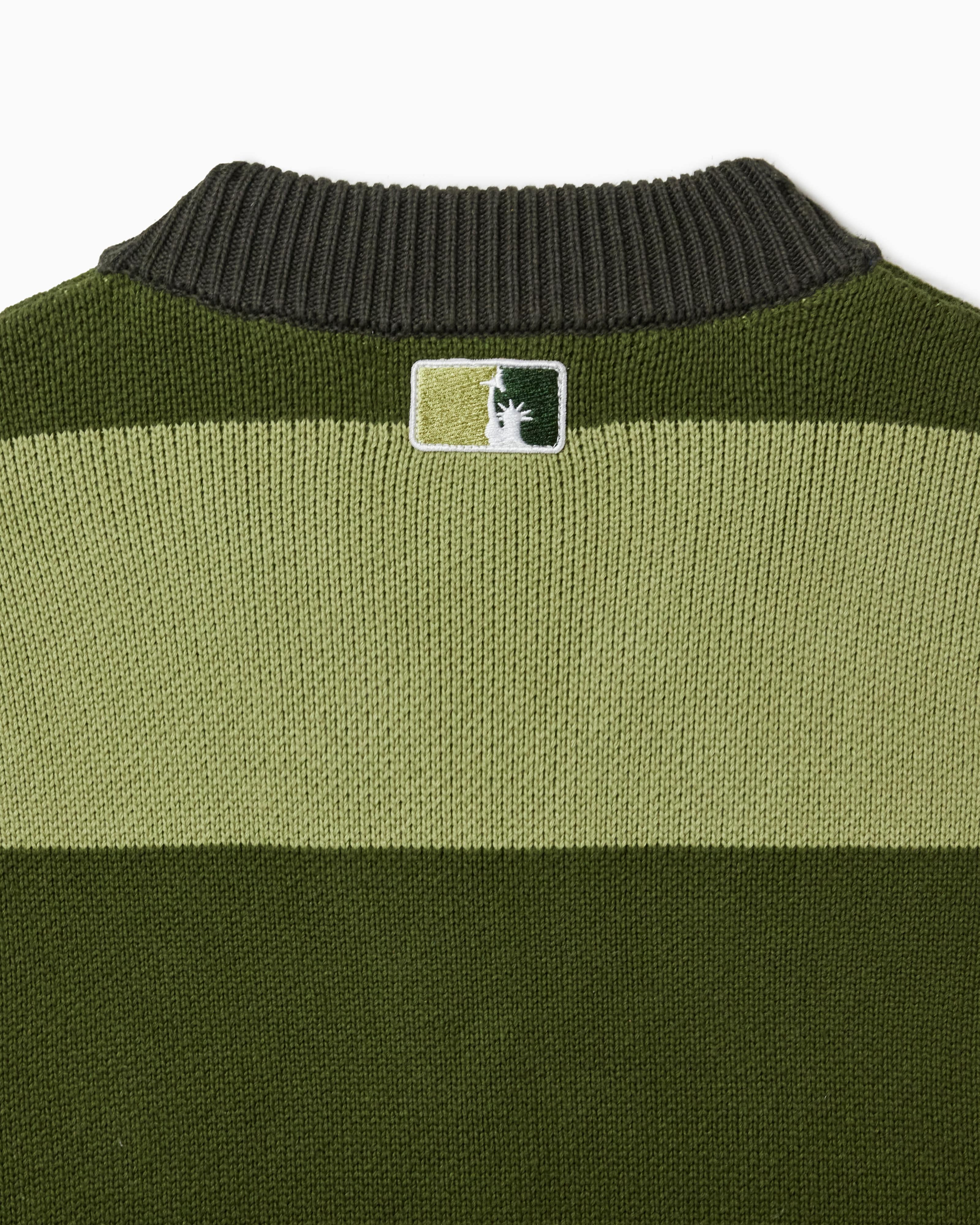 Wisdom of age 2024 olive green striped cardigan back logo