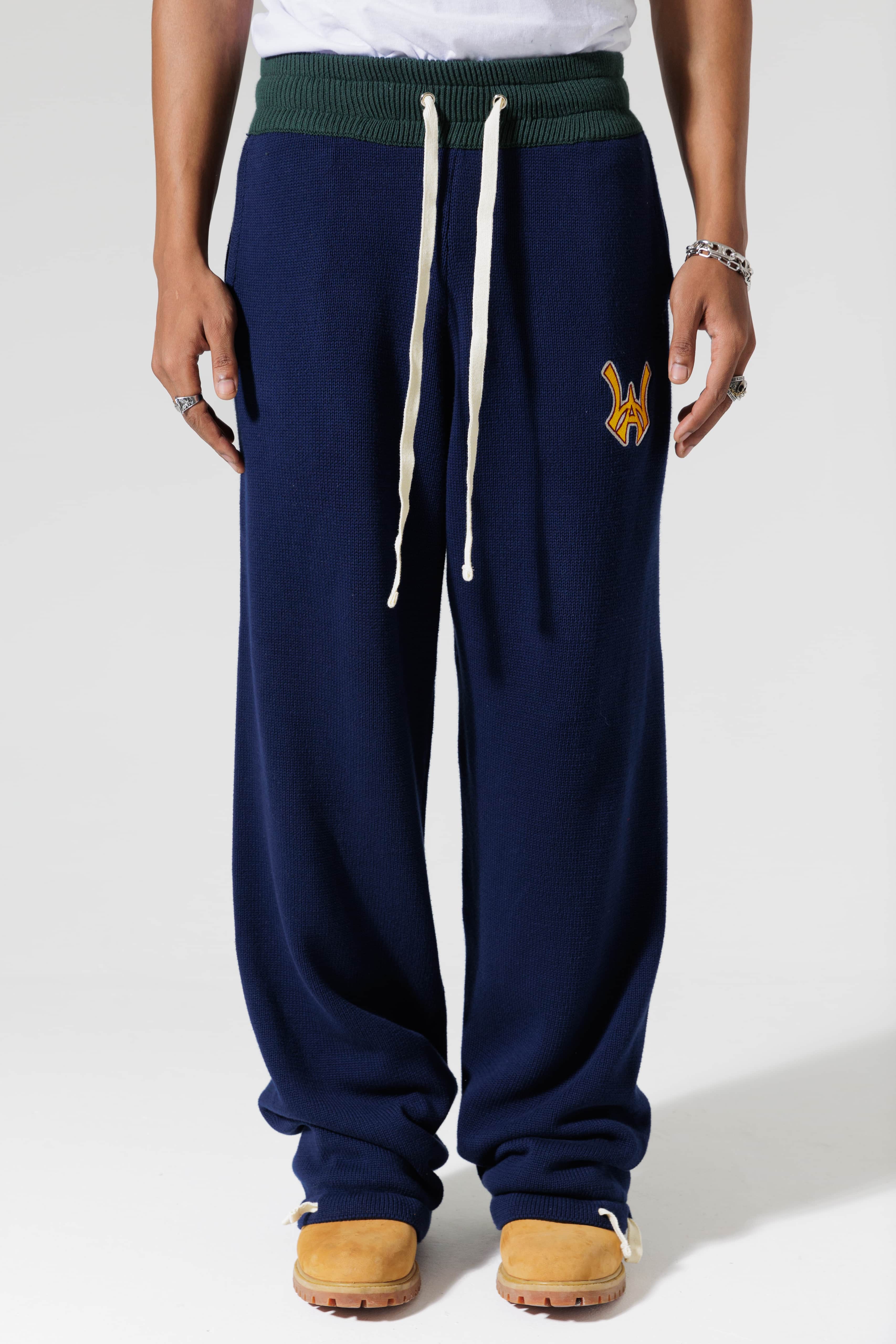 Genderless Model The Wisdom Of Age Knit Clinton Sweatpants Navy Front View.