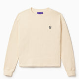 Front view of the Wisdom Of Age knit thermal shirt in cream. WA logo embroidered on the left chest.