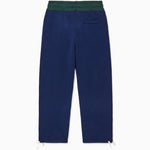 The Wisdom Of Age Knit Clinton Sweatpants Navy Rear View with a dark green waistband.