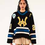 Female model Wearing The Wisdom Of Age Hockey Jersey - Static Shock