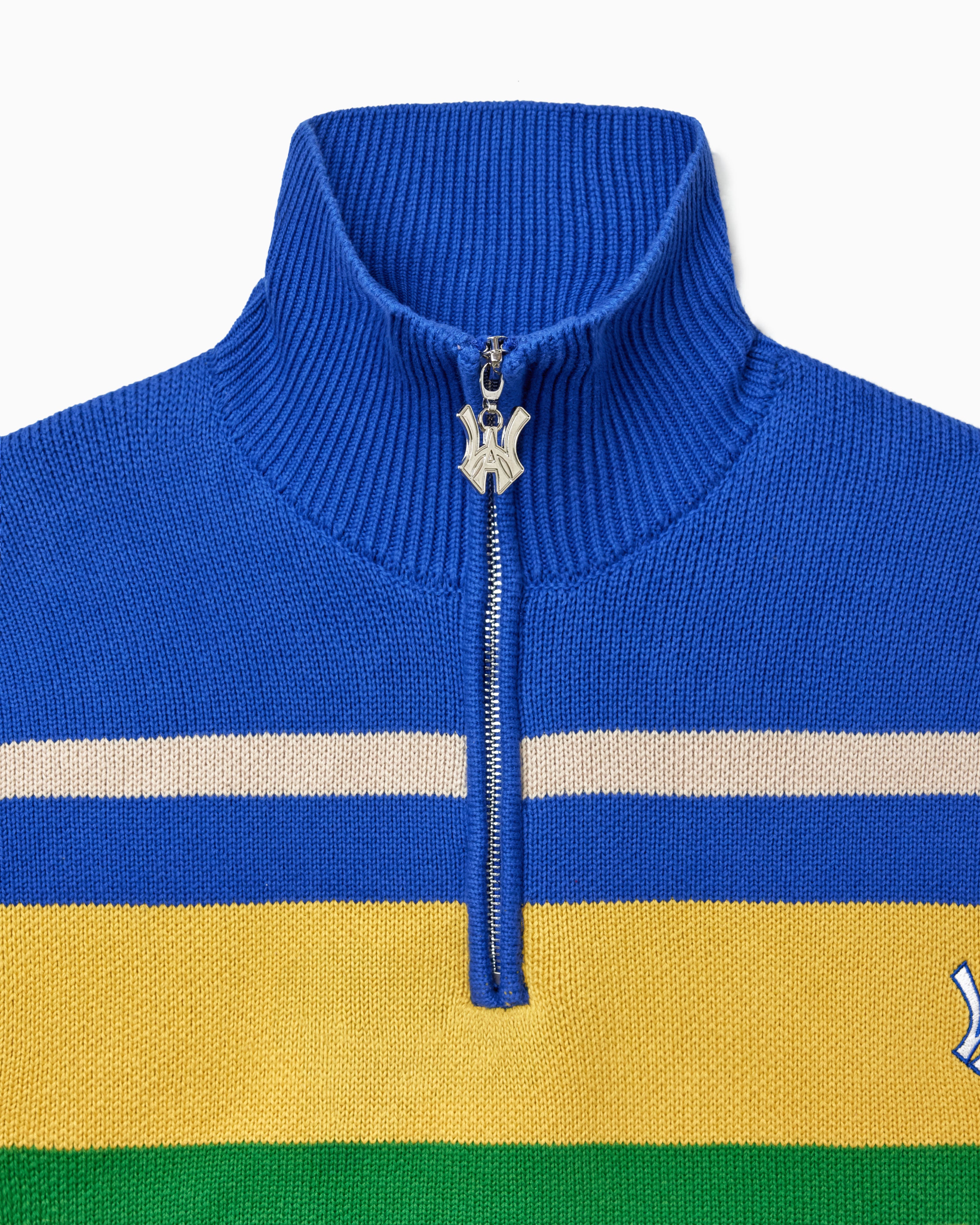 Blue, Green and yellow striped quarter zip sweater with a WA logo zipper on a white background