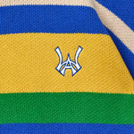 Close-up of a multicolored fabric with the WA logo in the center
