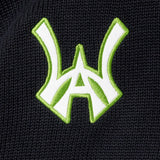 WA logo in white with a neon green outline
