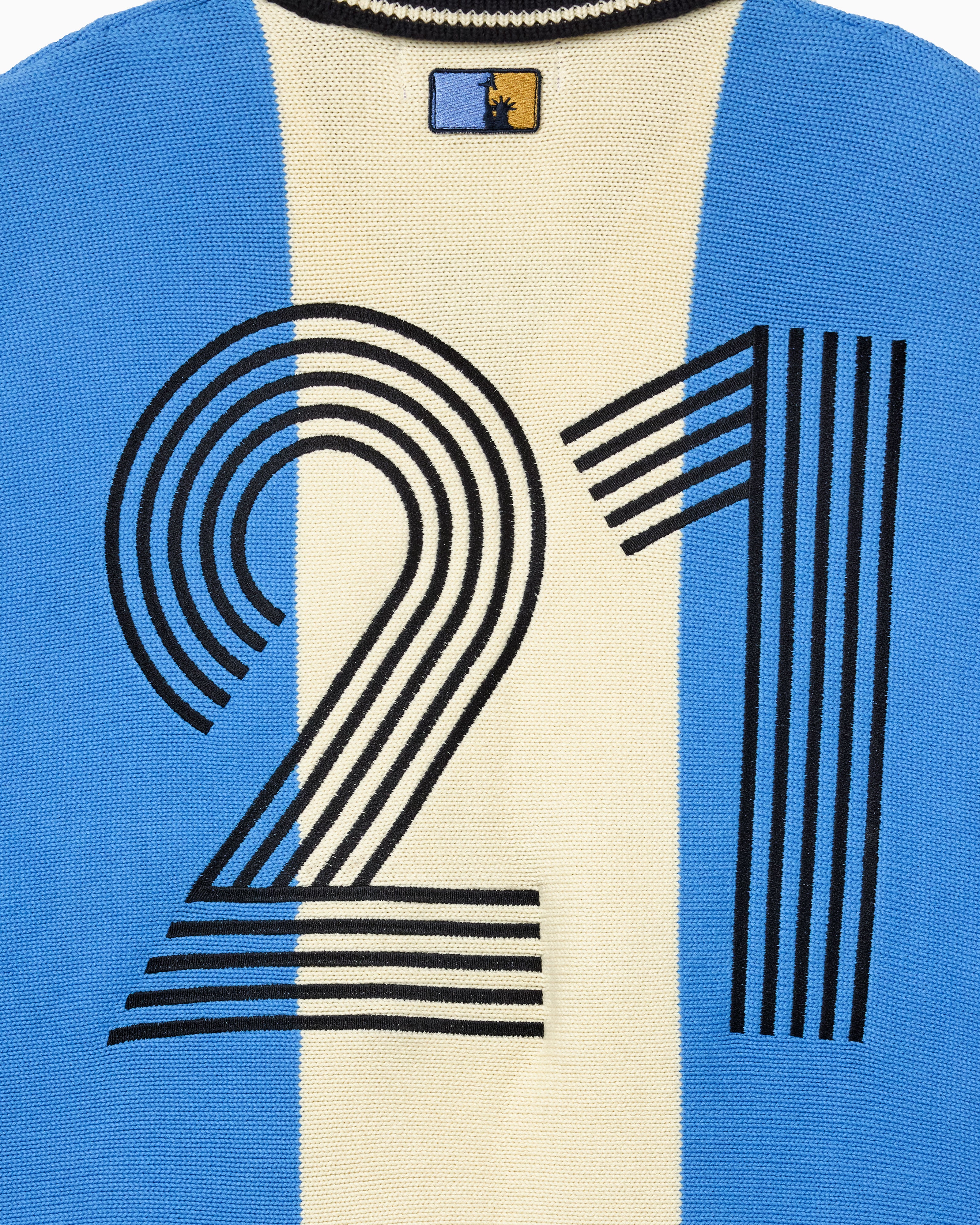 Knitted Soccer Jersey with number 21 design on a blue and beige background