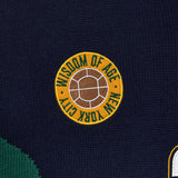 Close-up of a logo on a black background with 'Wisdom of Age New York City' text.