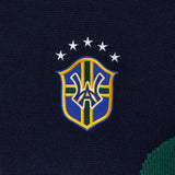 Close-up of a WA crest on a black fabric background