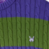 Close-up of a purple and green cable knit T-Shirt with WA logo on a white background.