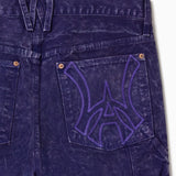 Close up of WOA Canvas Carpenter Shorts in Brick with WA logo on the right back pocket on a white