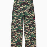 Camouflage pants with a WA logo on a white background