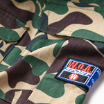 Camouflage fabric with the W.O.A patch on a white background