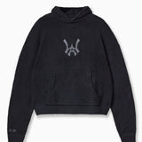 Wisdom of Age Knit Hoodie in Black. Waffle knit texture with the WA symbol in the chest of the hoodie. Kangaroo pocket and embroidered right sleeve with brand name.
