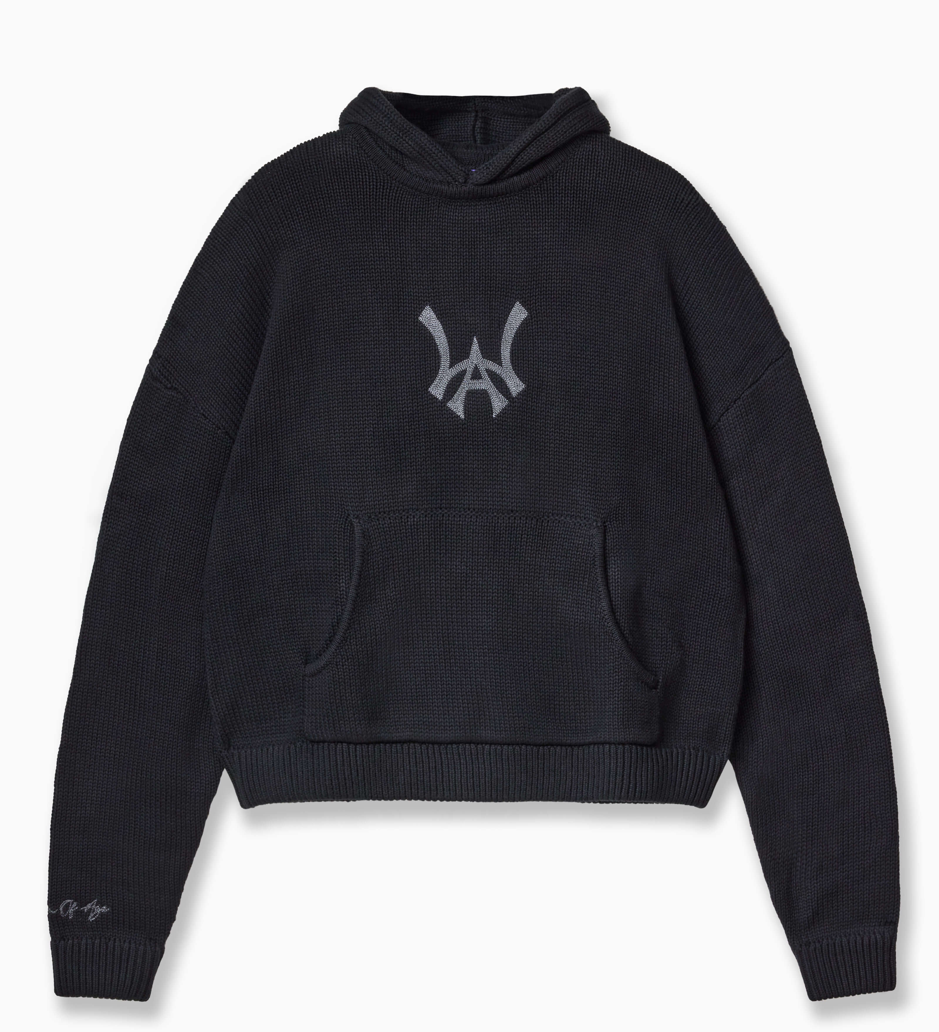 Wisdom of Age Knit Hoodie in Black. Waffle knit texture with the WA symbol in the chest of the hoodie. Kangaroo pocket and embroidered right sleeve with brand name.
