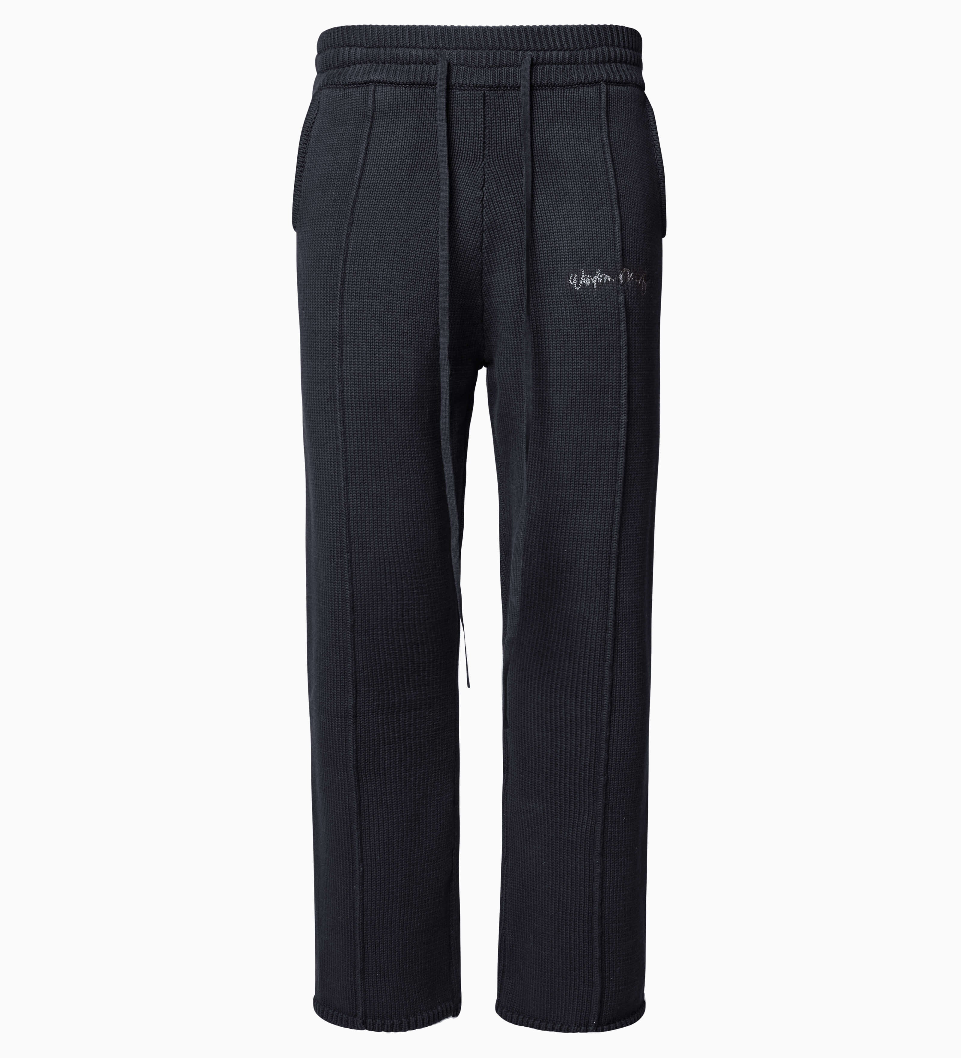 Wisdom of Age Knit Sweatpant in Black. Waffle knit texture with drawstrings elasticized waistband. Side slip-in pockets and script brand name embroidered on front left leg.