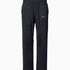 Wisdom of Age Knit Sweatpant in Black. Waffle knit texture with drawstrings elasticized waistband. Side slip-in pockets and script brand name embroidered on front left leg.