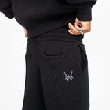 Right back angled view of the sweatpant and the WA chain stitch logo.