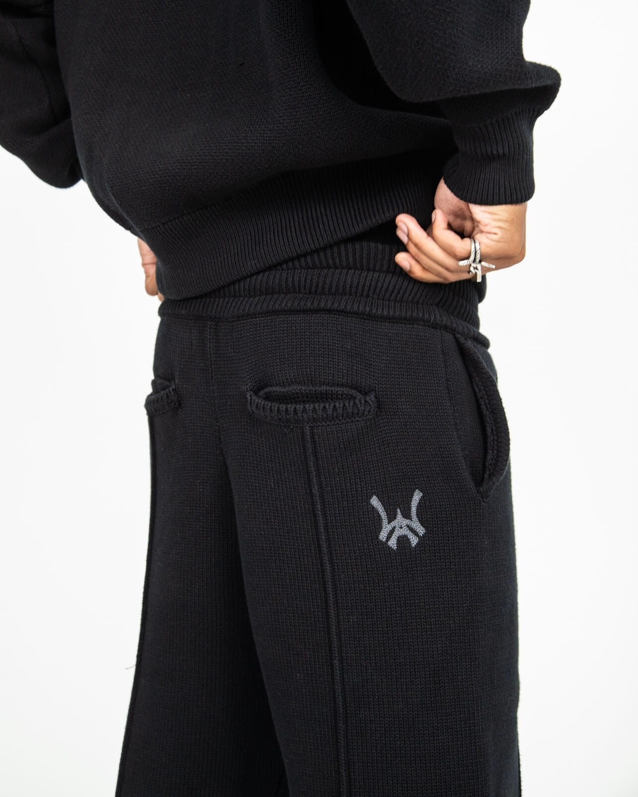 Right back angled view of the sweatpant and the WA chain stitch logo.