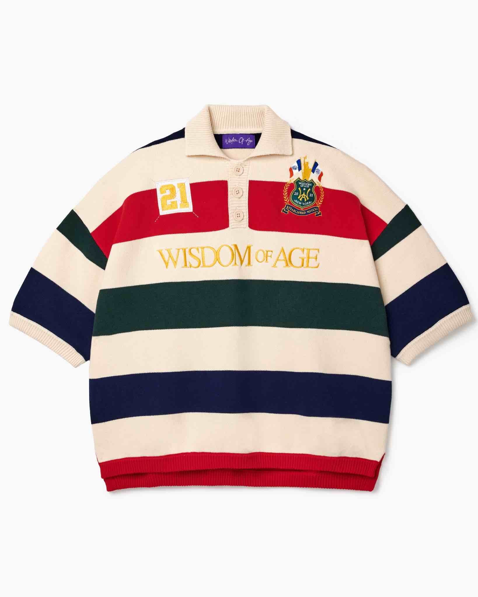 Wisdom of Age Bleecker Rugby Polo in multicolor stripes front view with WISDOM OF AGE embroidery, 21 number patch, and ornate brand emblem on white background.