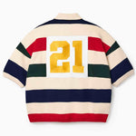 Wisdom of Age Bleecker Rugby Polo in multicolor stripes back view with gold embroidered 21 patch on white background.