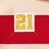 Wisdom of Age Bleecker Rugby Polo in multicolor stripes zoomed front view of embroidered 21 .