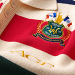 Wisdom of Age Bleecker Rugby Polo in multicolor stripes zoomed front view of premium cotton knit material and brand embroidery .